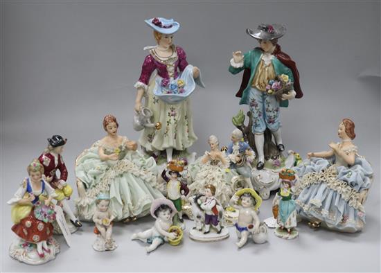 A pair of modern porcelain figures of gardeners, three Capodimonte lace figures and eight other figures